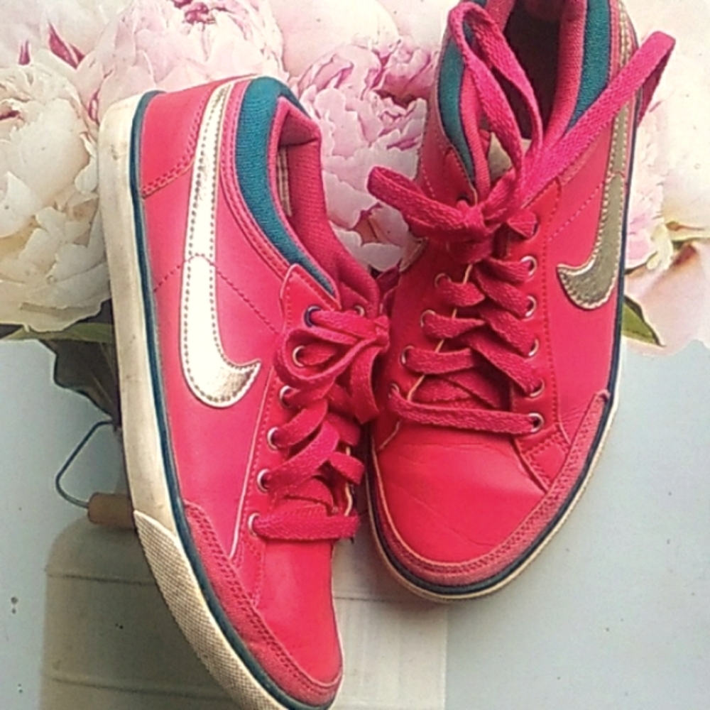 Nike Pink Sneakers with Teal Trim and Silver Swoosh